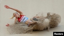 China - Darya Klishina of Russia competes in the women's long jump qualifying round during the 15th IAAF World Championships at the National Stadium in Beijing, China, August 27, 2015