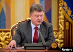 Назначит ли президент Украины Петр Порошенко новые выборы, пока неизвестно